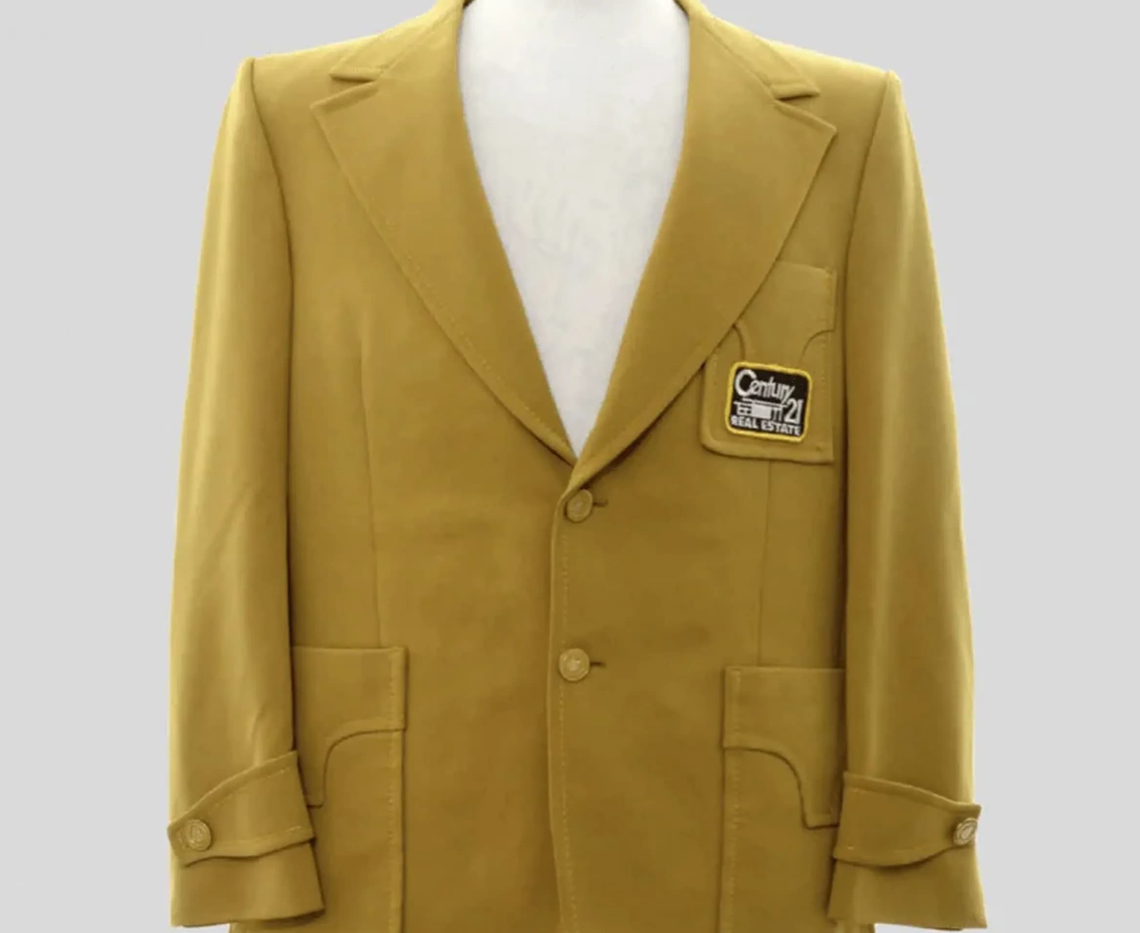 The iconic CENTURY 21 gold jacket